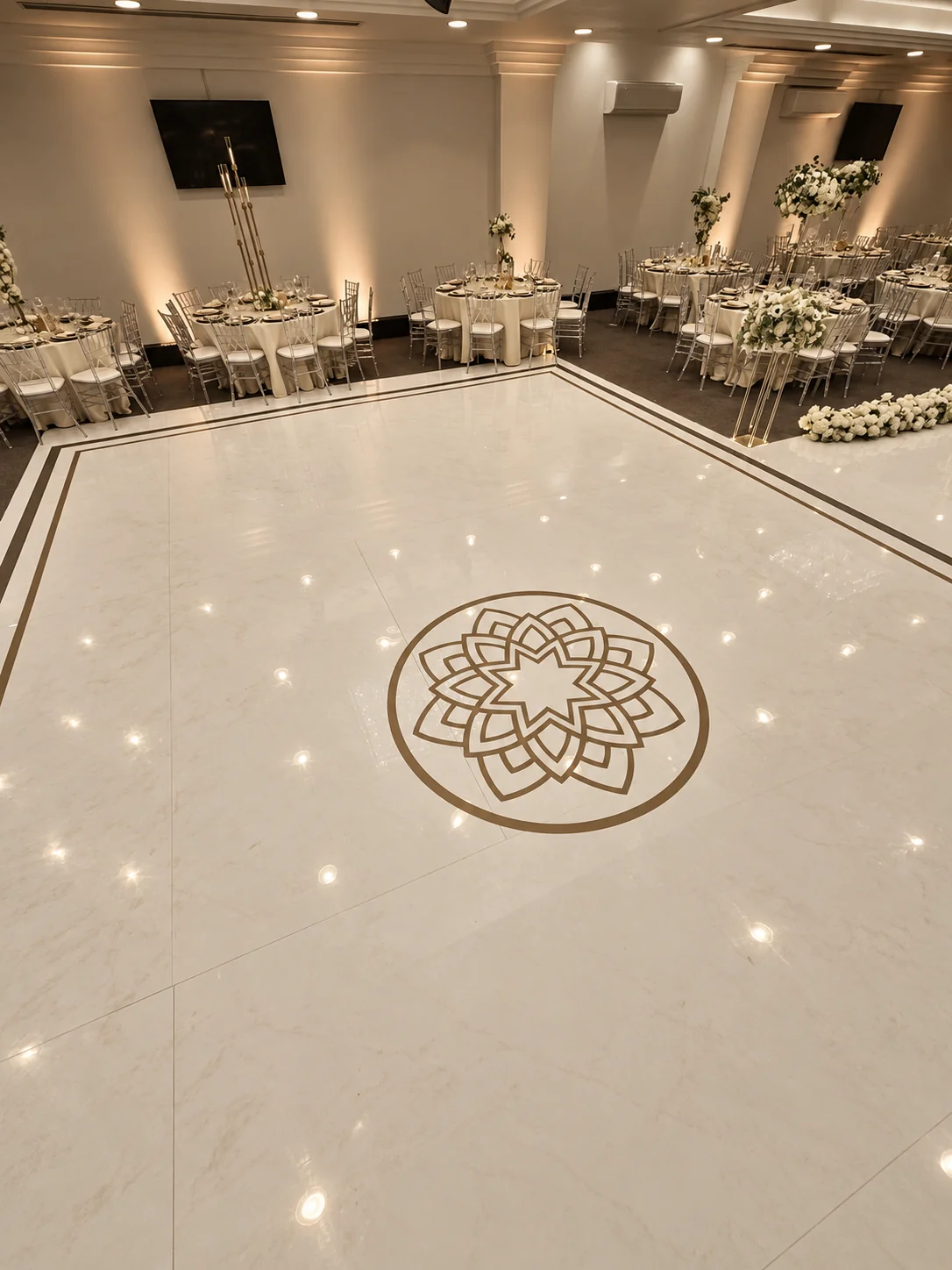 Geometric dance floor design in a taupe and ivory colour treatment